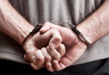 В Шымкенте охранника посадили на три года за избиение подростка Наручники. Арест