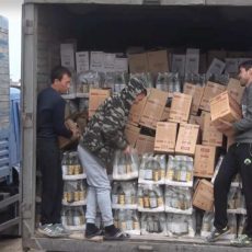 В Шымкенте трактор раздавил почти 39 тысяч бутылок коньяка, водки и пива