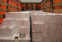 Под видом продуктов питания в Шымкент везли 18 тысяч бутылок водки Конфискованная водка