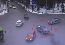 Полицейского три километра тащили на капоте авто в Шымкенте (видео) полицейский на капоте