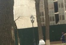 Служба под проливным дождем