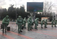 В Шымкенте 120 солдат обработали главную площадь города