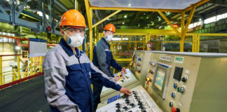 В Казахстане разработали алгоритм противоэпидемического режима в офисах и промпредприятиях Производство. Респиратор