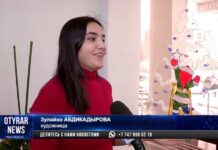 Художница раскрасила шымкентские окна в новый год