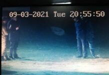 Попытка переброса телефонов на территорию колонии попала на видео в Шымкенте