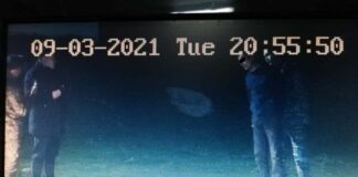 Попытка переброса телефонов на территорию колонии попала на видео в Шымкенте