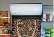 Табак за шторку: В магазинах витрины с табачными изделиями завешивают коврами ковер