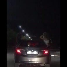 Девушки вылезли из окна движущейся машины ради эффектного видео