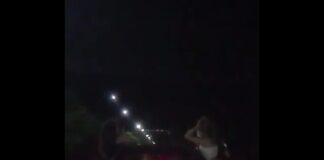 Девушки вылезли из окна движущейся машины ради эффектного видео